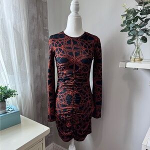 Navy and dark orange Zara bodycon dress with long sleeves and ruched center